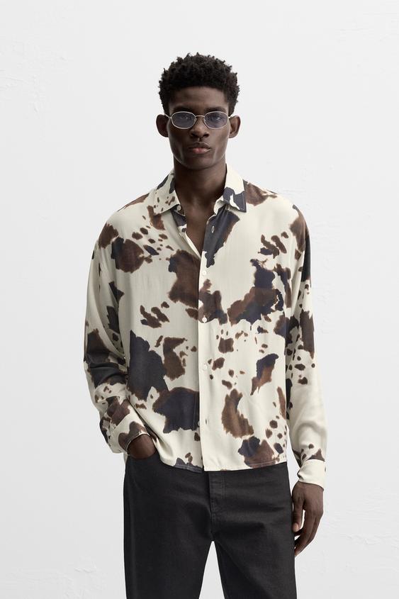 CAMISA COM ESTAMPADO ANIMAL PRINT