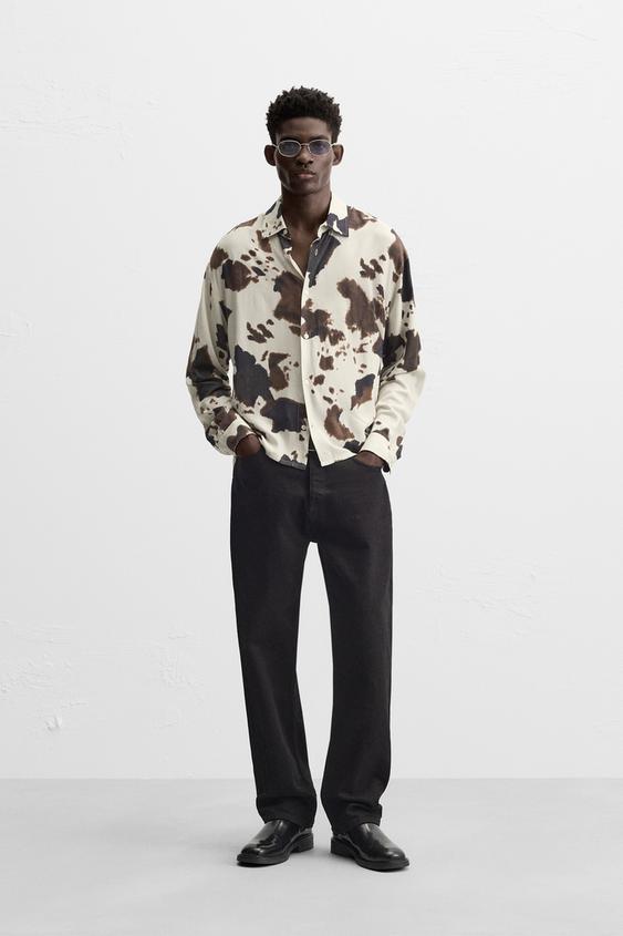 CAMISA COM ESTAMPADO ANIMAL PRINT