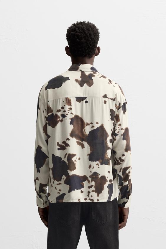 CAMISA COM ESTAMPADO ANIMAL PRINT