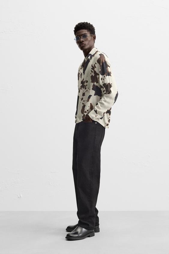 CAMISA COM ESTAMPADO ANIMAL PRINT