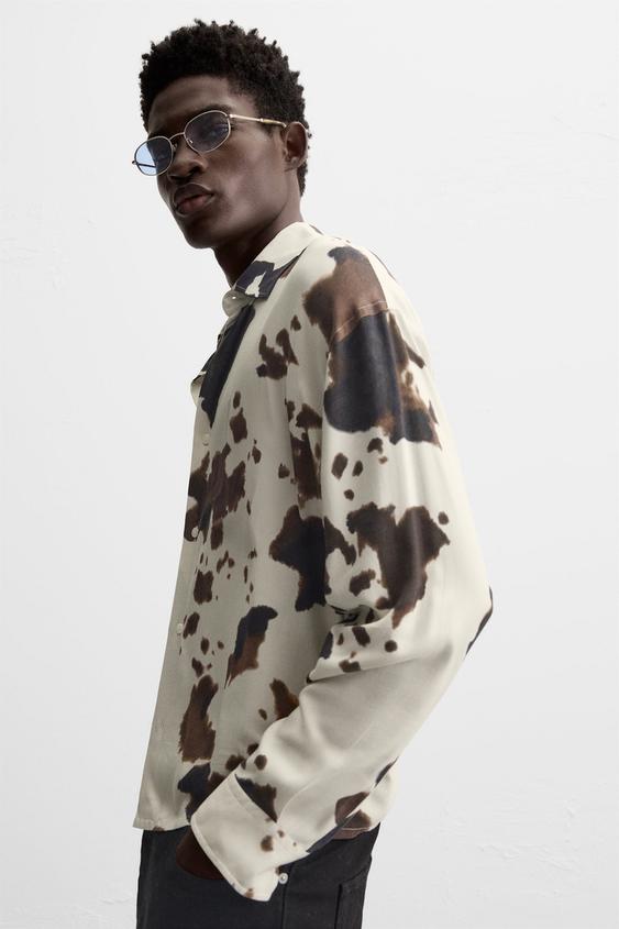 CAMISA COM ESTAMPADO ANIMAL PRINT