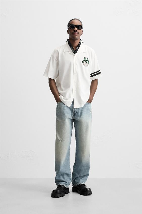 CAMISA COM REMENDO COMBINADO