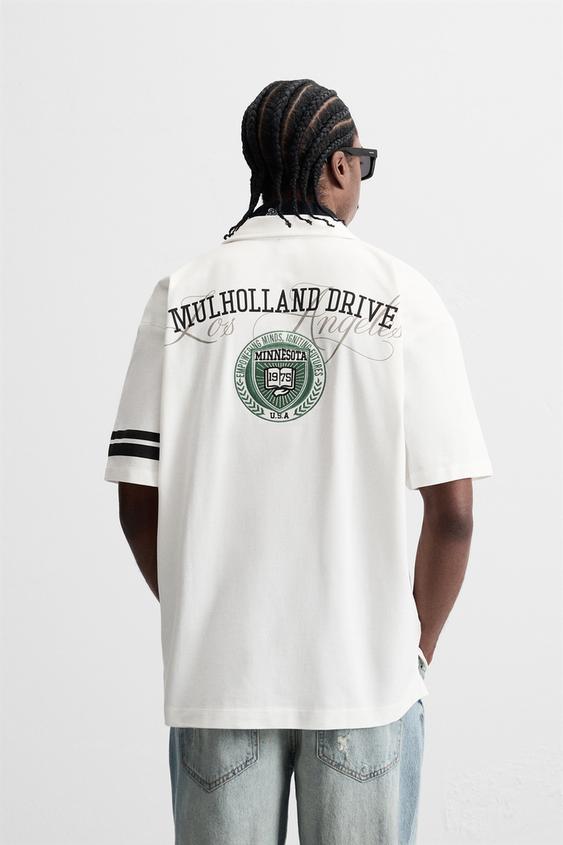 CAMISA COM REMENDO COMBINADO