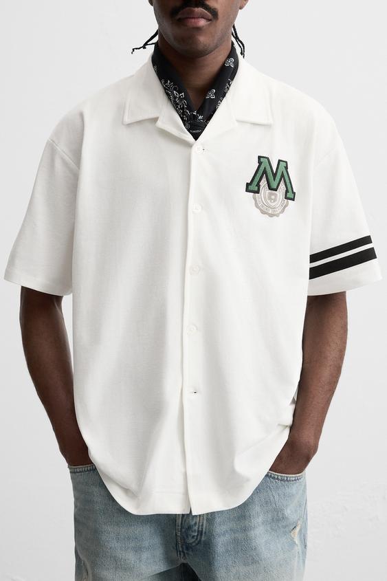 CAMISA COM REMENDO COMBINADO