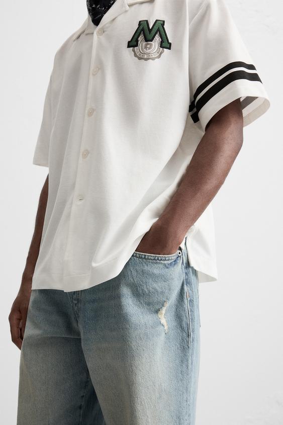 CAMISA COM REMENDO COMBINADO