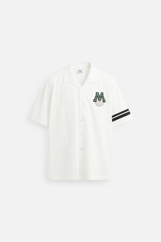 CAMISA COM REMENDO COMBINADO