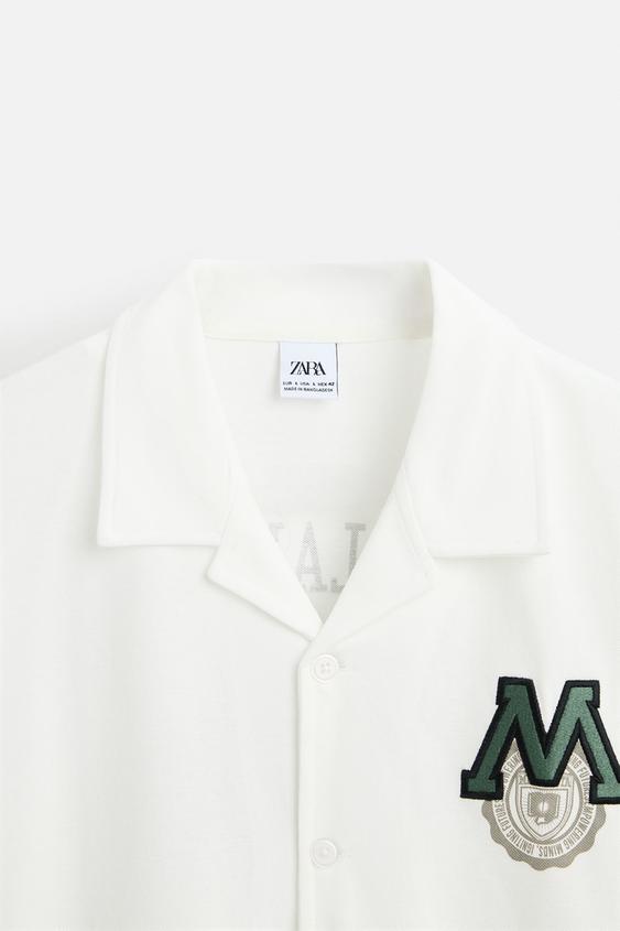 CAMISA COM REMENDO COMBINADO