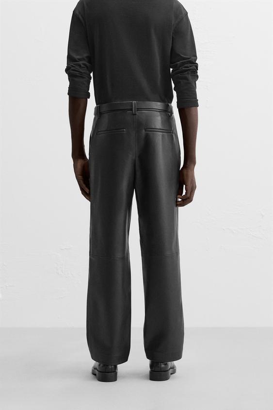 CALÇA DE POLIURETANO COM PREGAS