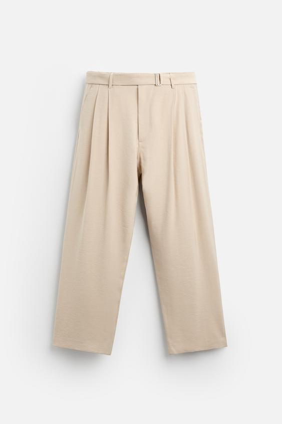 CALÇA COM PREGAS E CINTO