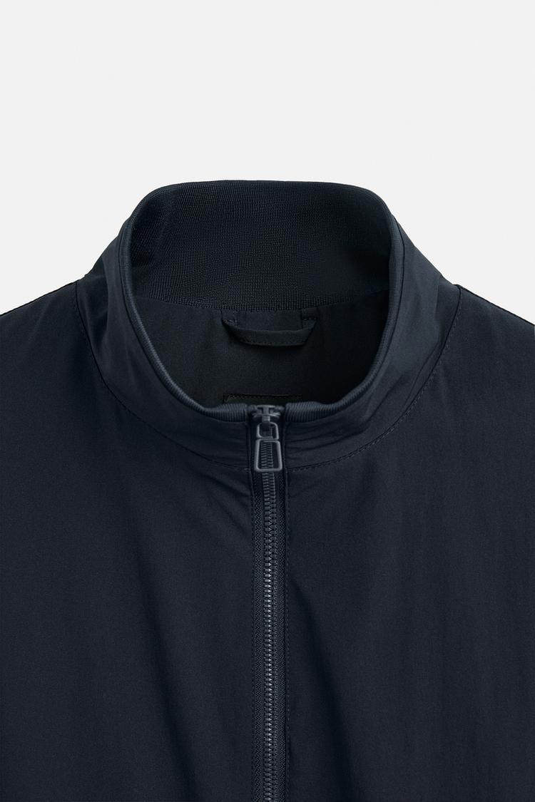 JAQUETA BOMBER TÉCNICA