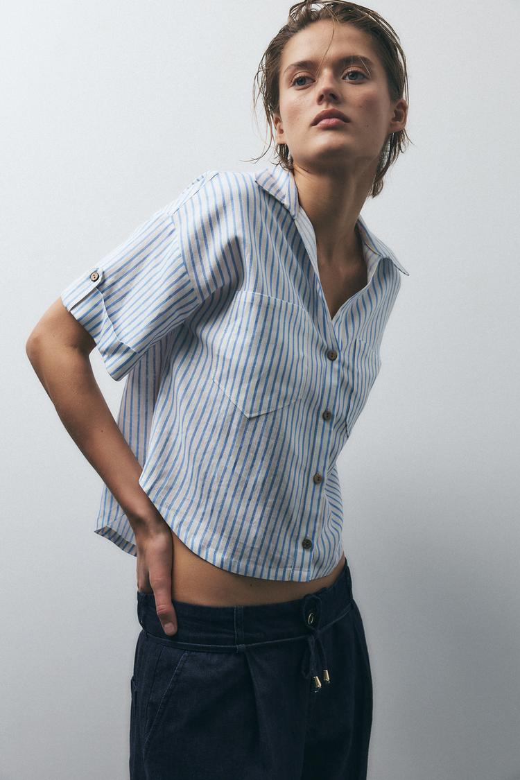 CAMISA COM LISTRAS E BOLSOS