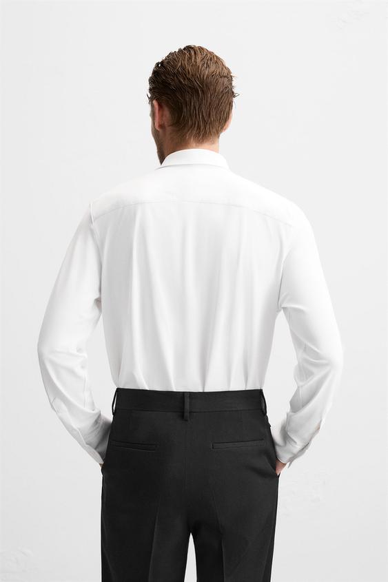 CAMISA ELÁSTICA COM TEXTURA
