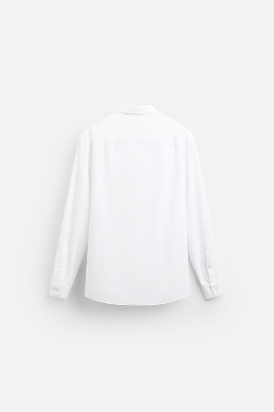 CAMISA ELÁSTICA COM TEXTURA