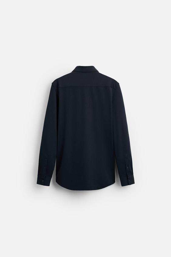 CAMISA ELÁSTICA COM TEXTURA