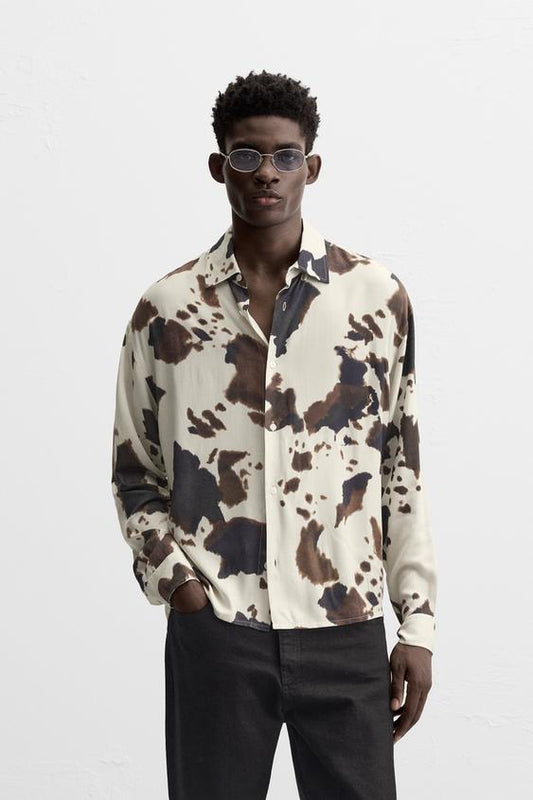 CAMISA COM ESTAMPADO ANIMAL PRINT