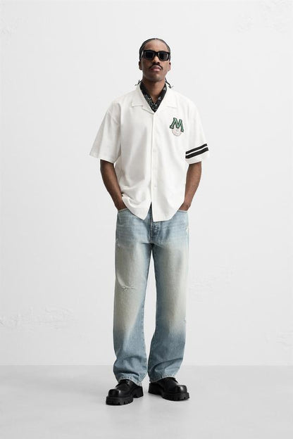 CAMISA COM REMENDO COMBINADO
