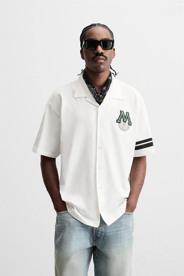CAMISA COM REMENDO COMBINADO