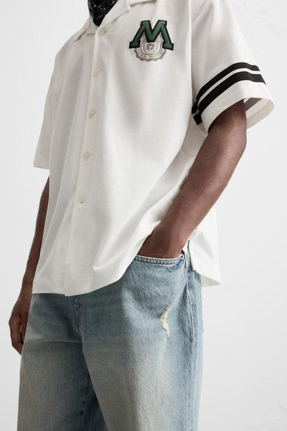 CAMISA COM REMENDO COMBINADO